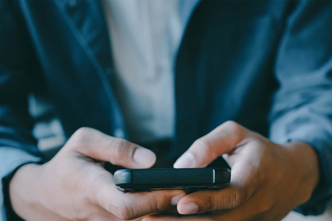 Hands holding a phone