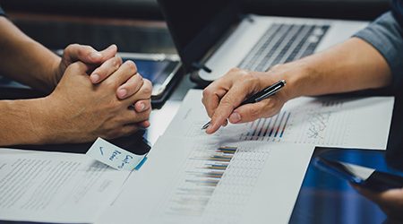 ManPointingAtDividends